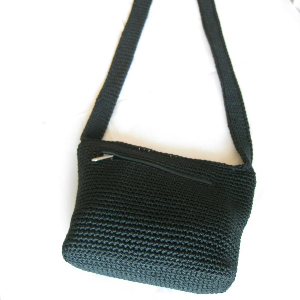 New medium size black SAK purse